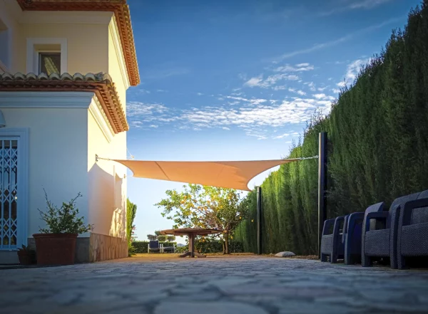 Wider coverage layout - Shade sails for light, visually open shade. in Alicante | Toldos Corona